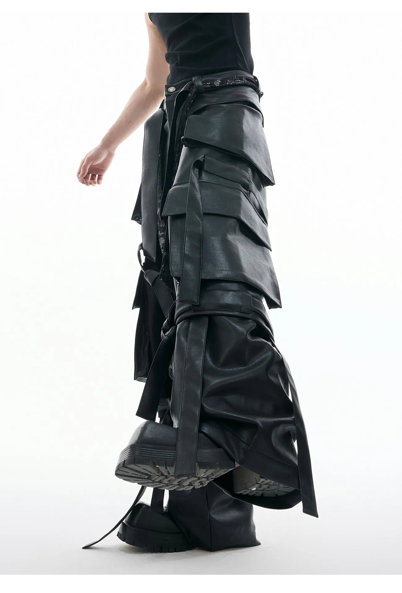 Black retro loose leather pants with quilted panels and multiple pockets