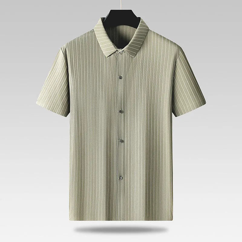 Man wearing a plus size loose fit black striped cardigan shirt with a square collar.