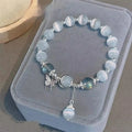 Glass butterfly bracelet for women with drop shape design and round beads in moonlight gray colour