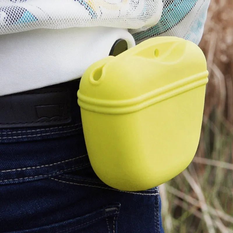 A silicone dog training treat bag with a belt clip, shown in one of six colour options.