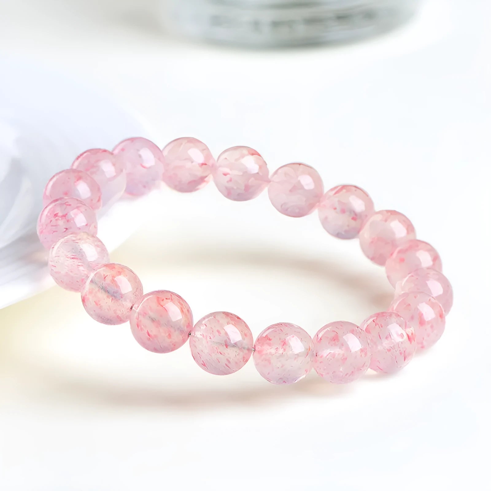 Strawberry quartz crystal bracelet with geometric 10-10.8mm beads