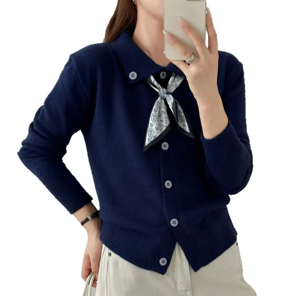 Milky white lazy fashion lapel scarf cardigan sweater with splicing detail and long sleeves.