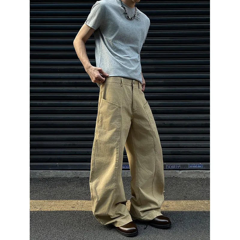 Men's khaki straight-leg cotton trousers laid flat, showing casual American retro style.