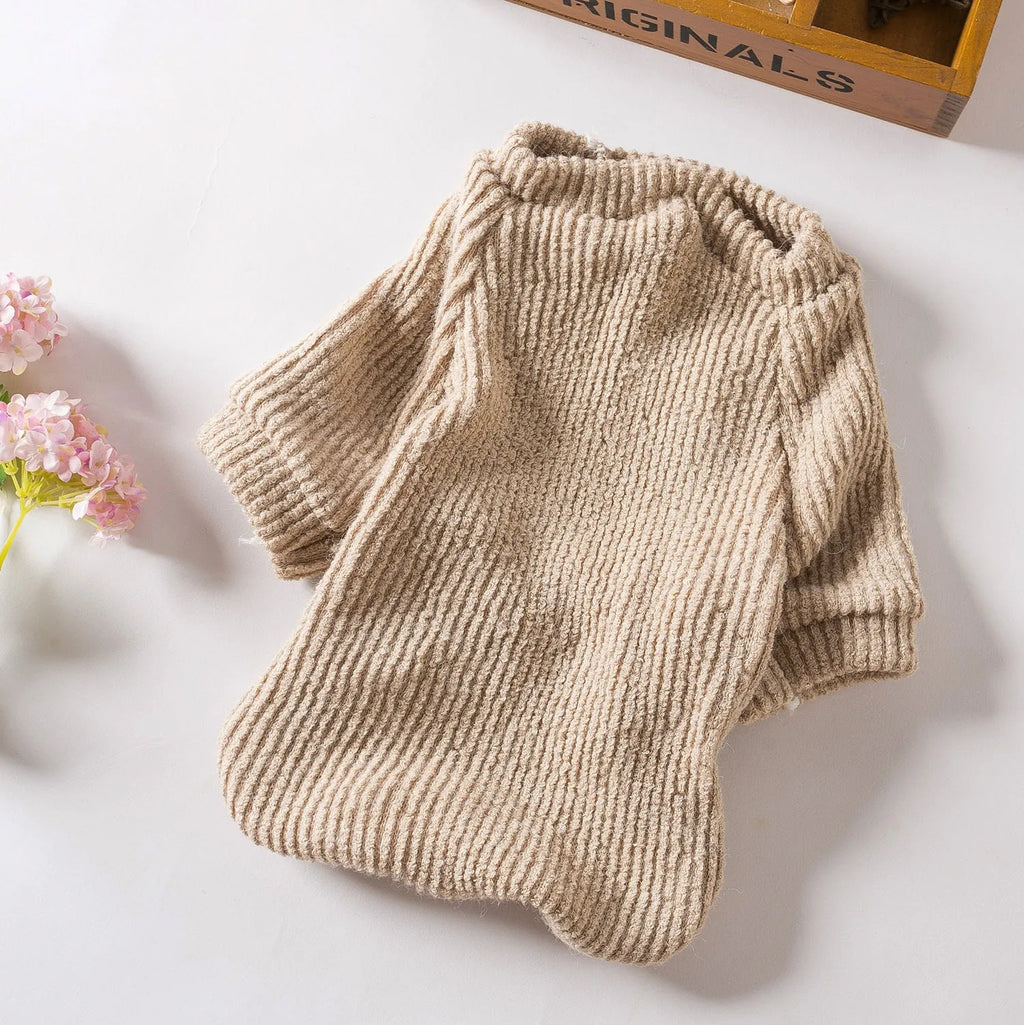 Brown cloth dog sweater pullover for small breeds on size chart showing XS to XL