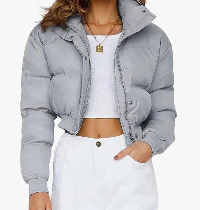 Women's loose fit long sleeve polyester jacket in blue colour on a hanger