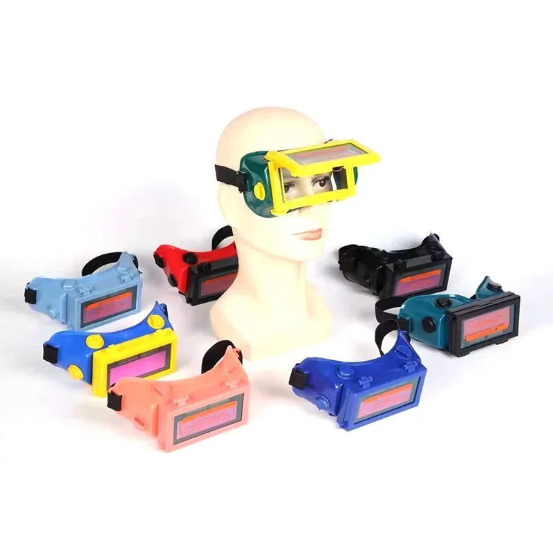 Green light-changing electric welding glasses with flip dimmer and PVC frame