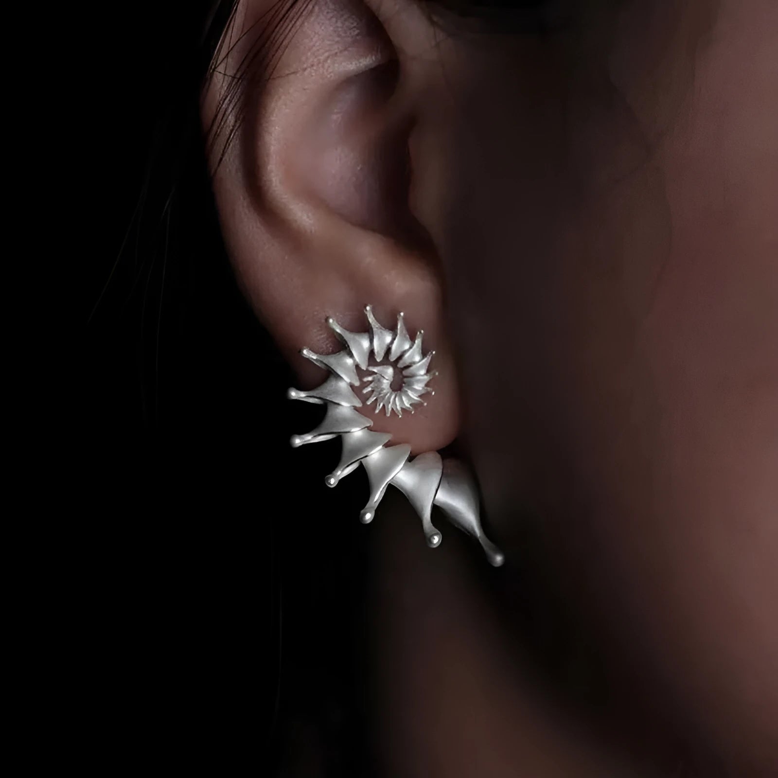 Exaggerated three-dimensional conch shell design matte earrings in alloy with electroplated finish