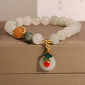 Women's ice jade bracelet with xiangyun peace pattern and pearl accents