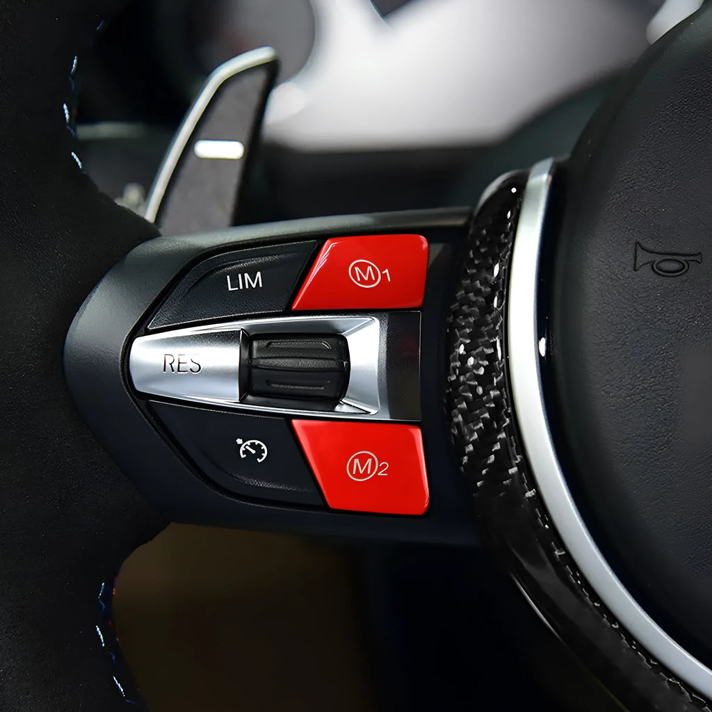 A pair of red M1M2 steering wheel mode buttons for BMW F30 and F34 models
