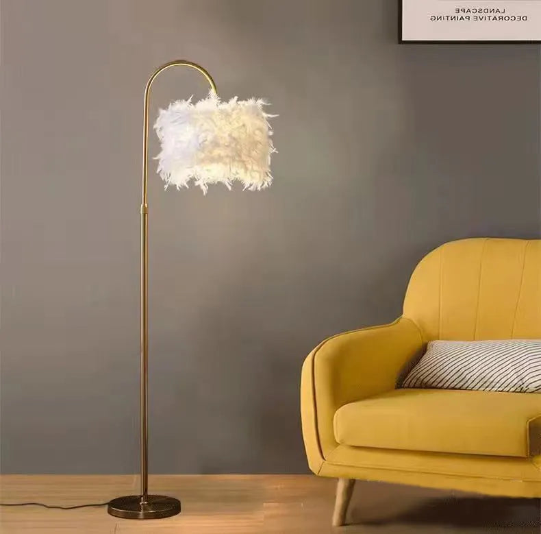 LED white feather floor lamp with gold copper finish and curved iron stand 155cm tall