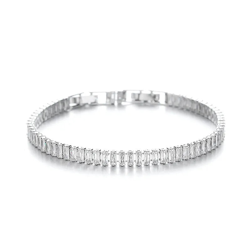 Rectangular geometric women's bracelet with full diamond zircon treatment in champagne gold colour