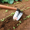 Agricultural pointed hoe tool with steel horse tip and flat hoe design for soil cultivation