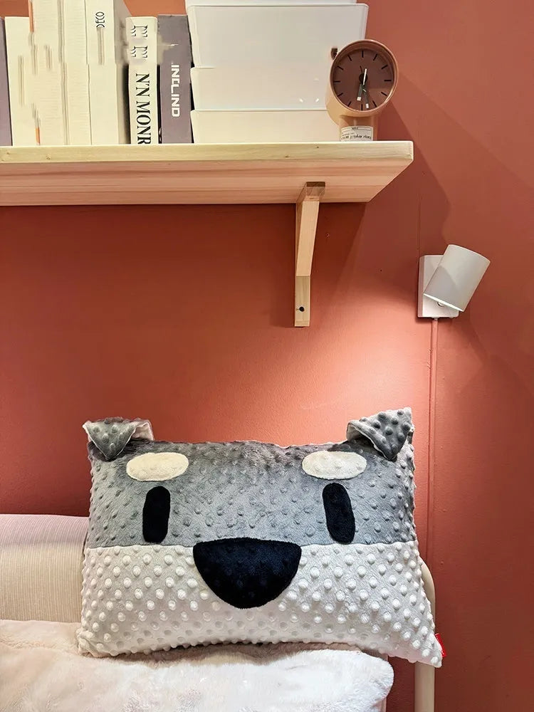 Grey West Highland puppy design soft dog pillow on a sofa