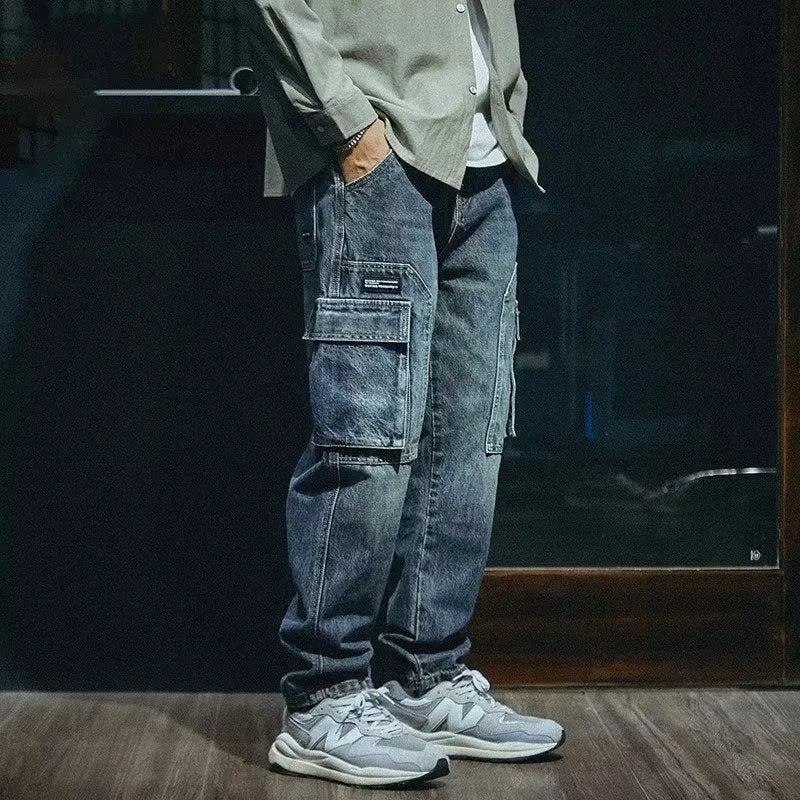 Men's blue loose straight leg retro style casual trousers on a neutral background