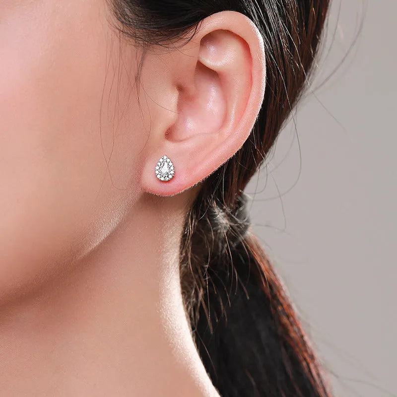 Silver water drop ear studs with geometric shape and diamond-cut surface