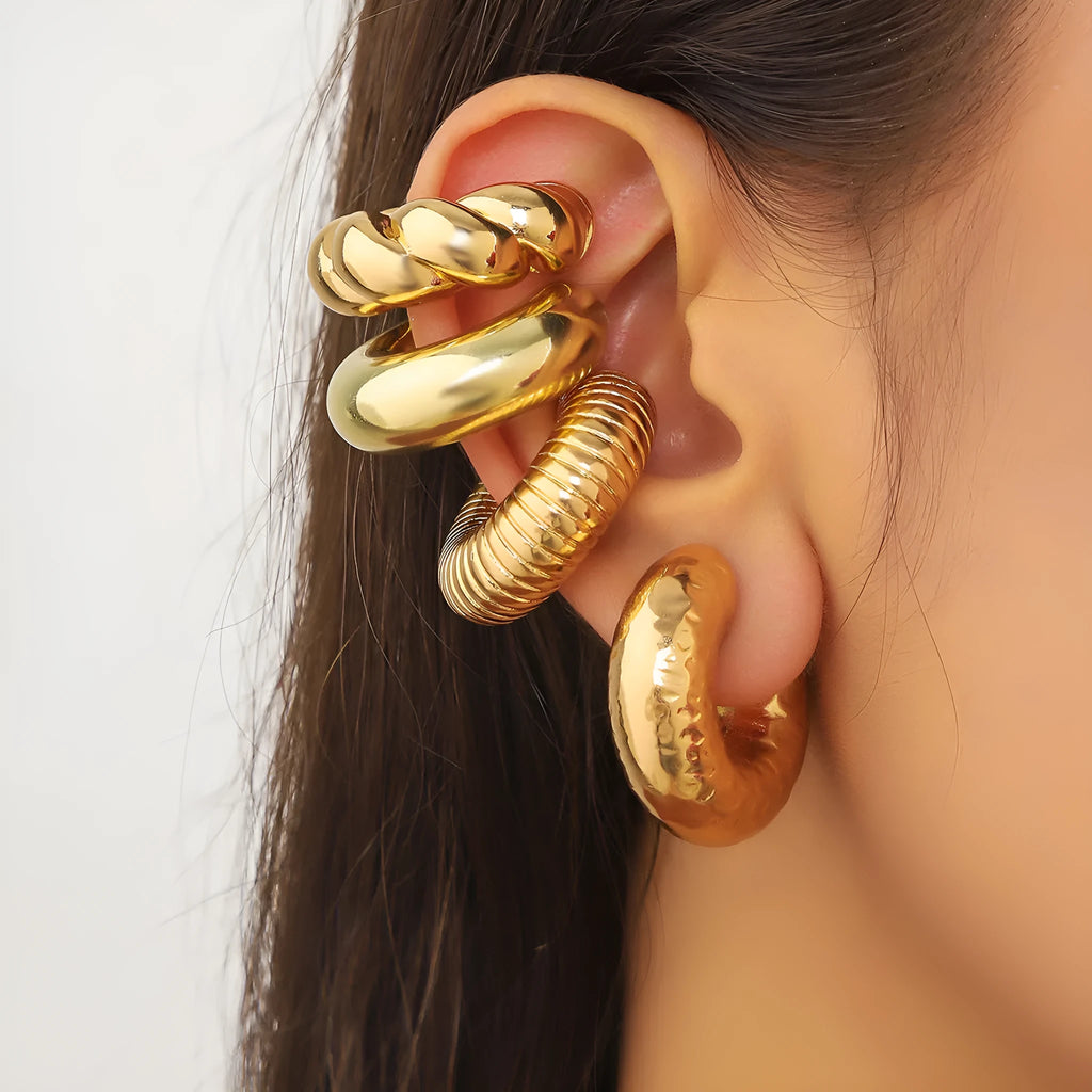 Set of four geometric clip-on earrings for women in gold and silver CCB alloy.