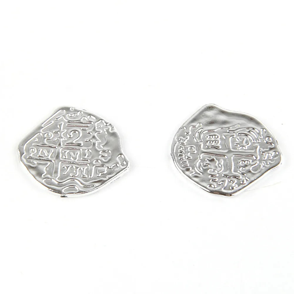 Set of 100 gold, silver, and bronze plastic replica Roman coins for props and crafts.