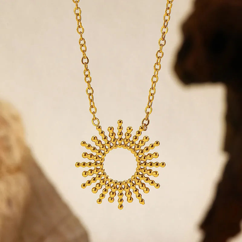 Sunflower series women's gold jewellery set showing necklace and bracelet with geometric chain design