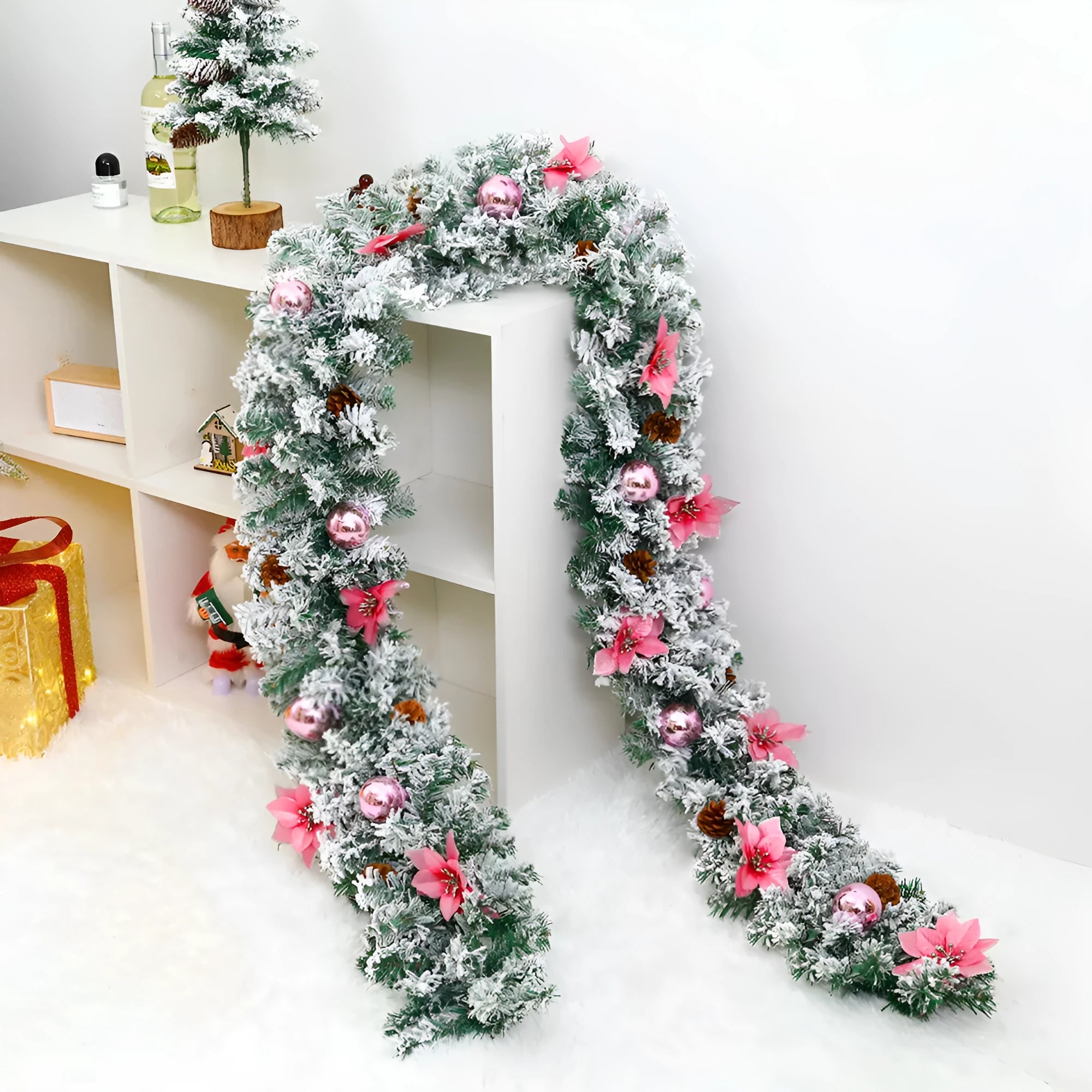 PVC Christmas rattan garland with flocking in red, hung on a door