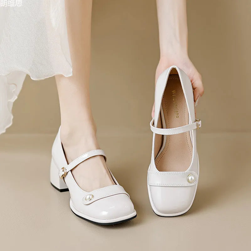 French style women's chunky heel pumps in patent leather with buckle fastening