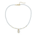 White shell bead necklace with conch pendant and mother-of-pearl detail