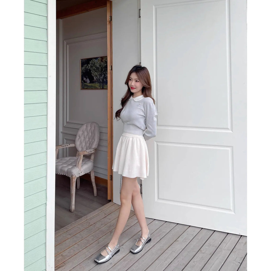 Women's leather Mary Jane flats with cross buckle strap in silver colour