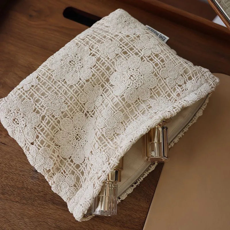 Handmade corduroy cosmetic bag with crocheted hollow flowers and ethnic embroidery in solid rope colour