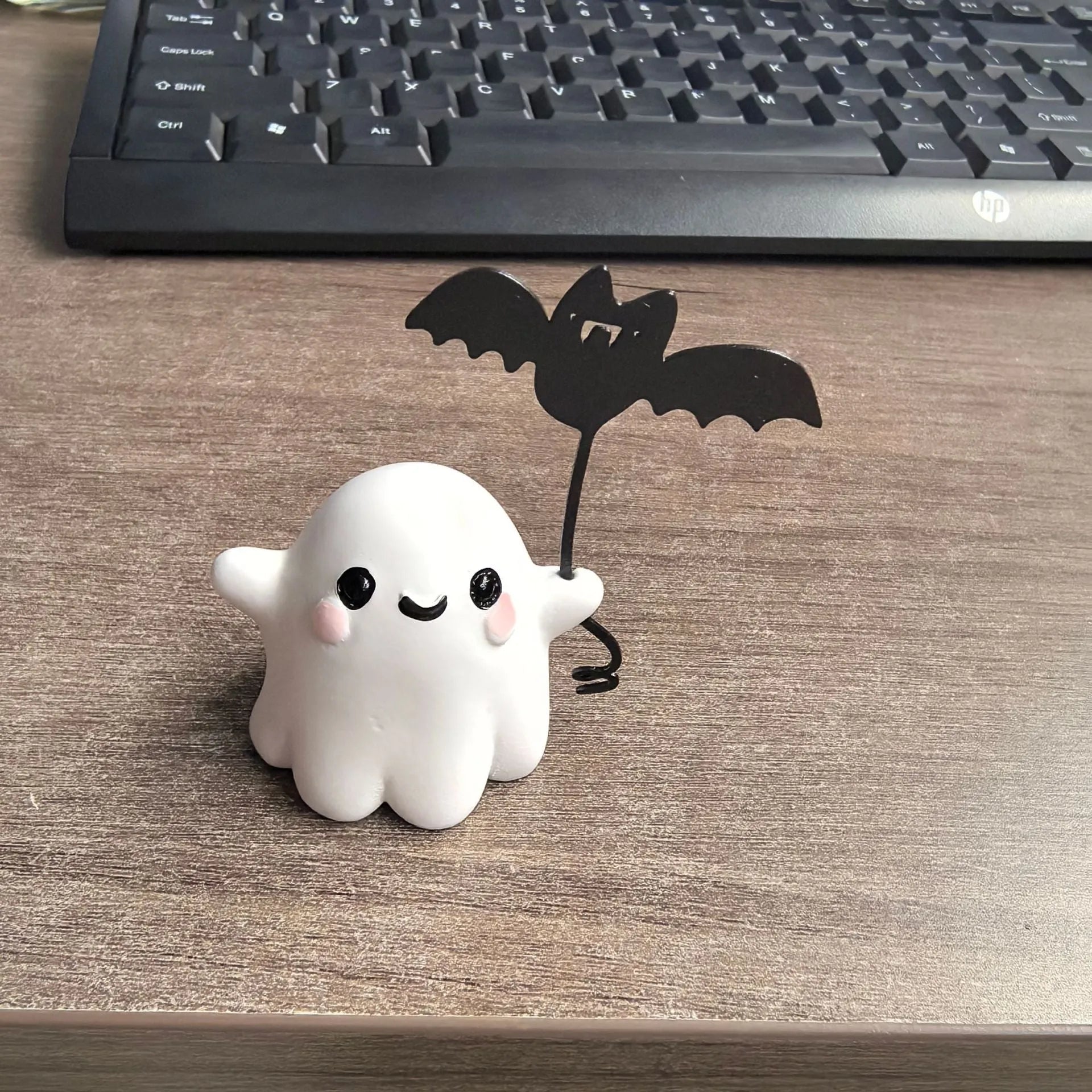 Miniature ghost walking dog Halloween statue made of resin, measuring 4x5x4cm.