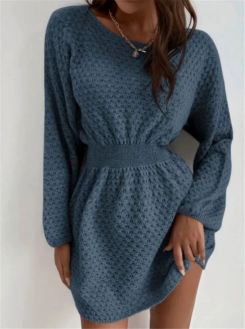 Blue women's knitted dress with hand-crocheted flowers and fitted waist design