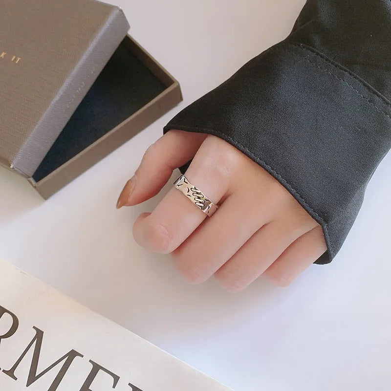 Black geometric adjustable copper ring with oval elements for women's fashion jewellery