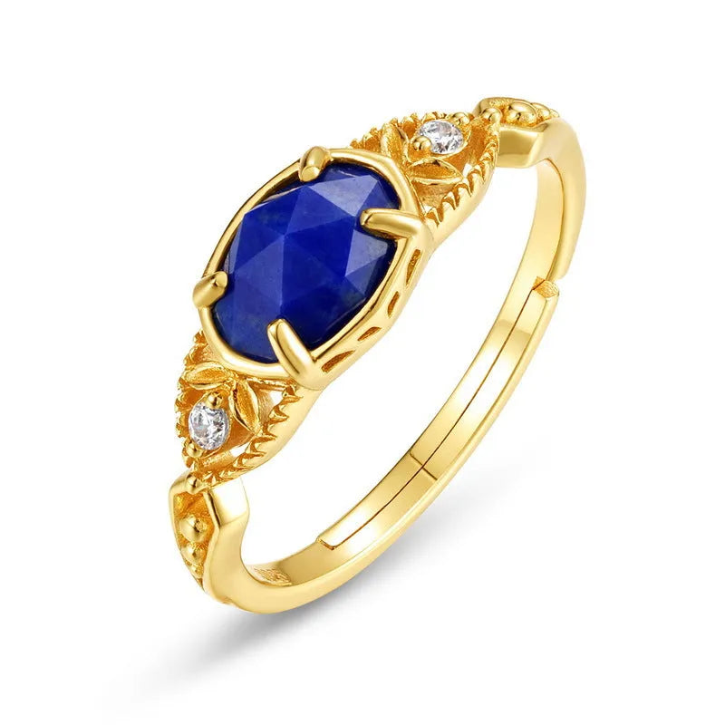 Silver alloy geometric ellipse ring with a deep blue lapis lazuli stone, Japanese style.