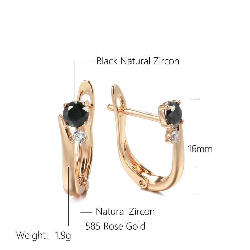 Women's gold geometric drop earrings with black agate stone effect and retro styling