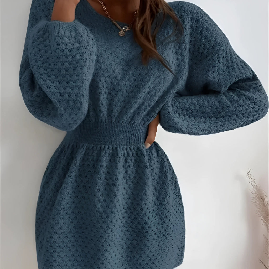 Blue women's knitted dress with hand-crocheted flowers and fitted waist design