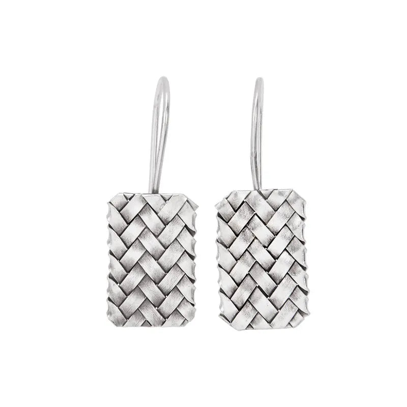Silver geometric earrings with woven diamond plaid pattern measuring 17.5mm by 11mm