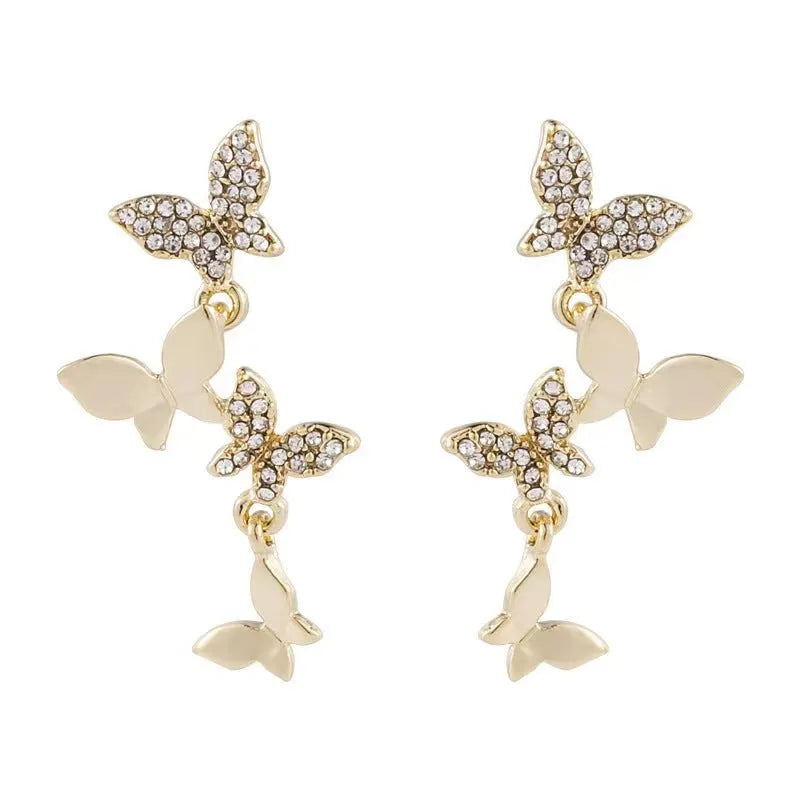 Gold colour copper butterfly drop earrings with four butterfly design elements