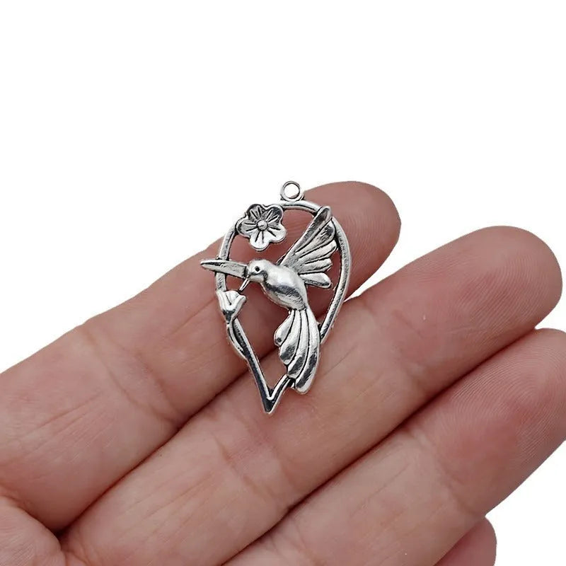 Alloy cuckoo bird pendant with magpie pattern for DIY jewellery making