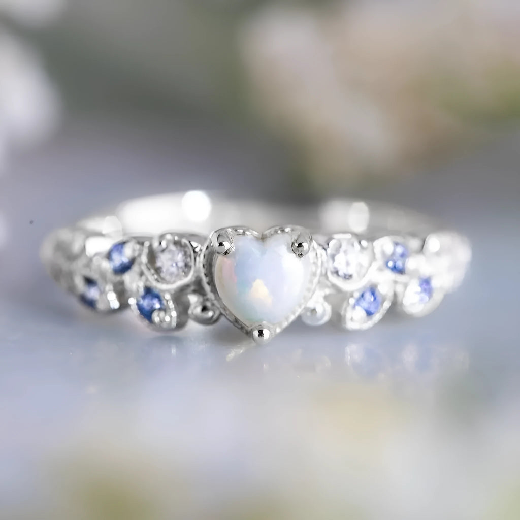 Heart-shaped women's ring with flower opal ocean design in peach colour on alloy band