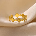 Gold titanium steel women's ring with geometric diamond design