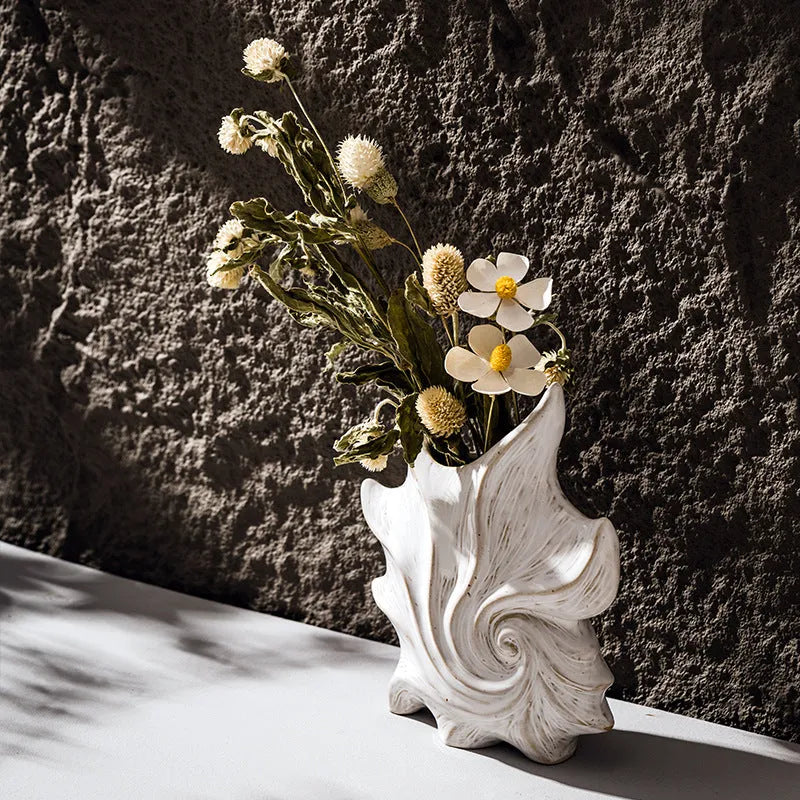French art style ceramic vase with coloured glaze finish on a table