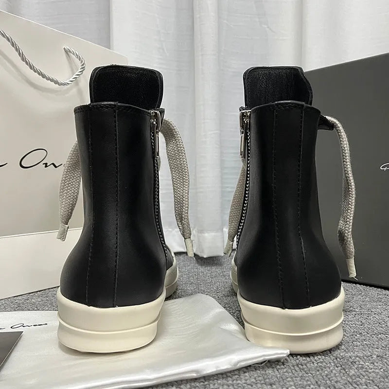 Black genuine cowhide leather high-top sneakers with a side zipper and platform sole.