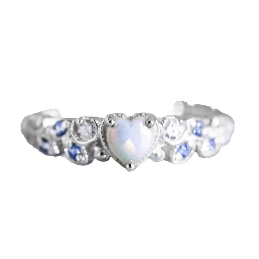 Heart-shaped women's ring with flower opal ocean design in peach colour on alloy band