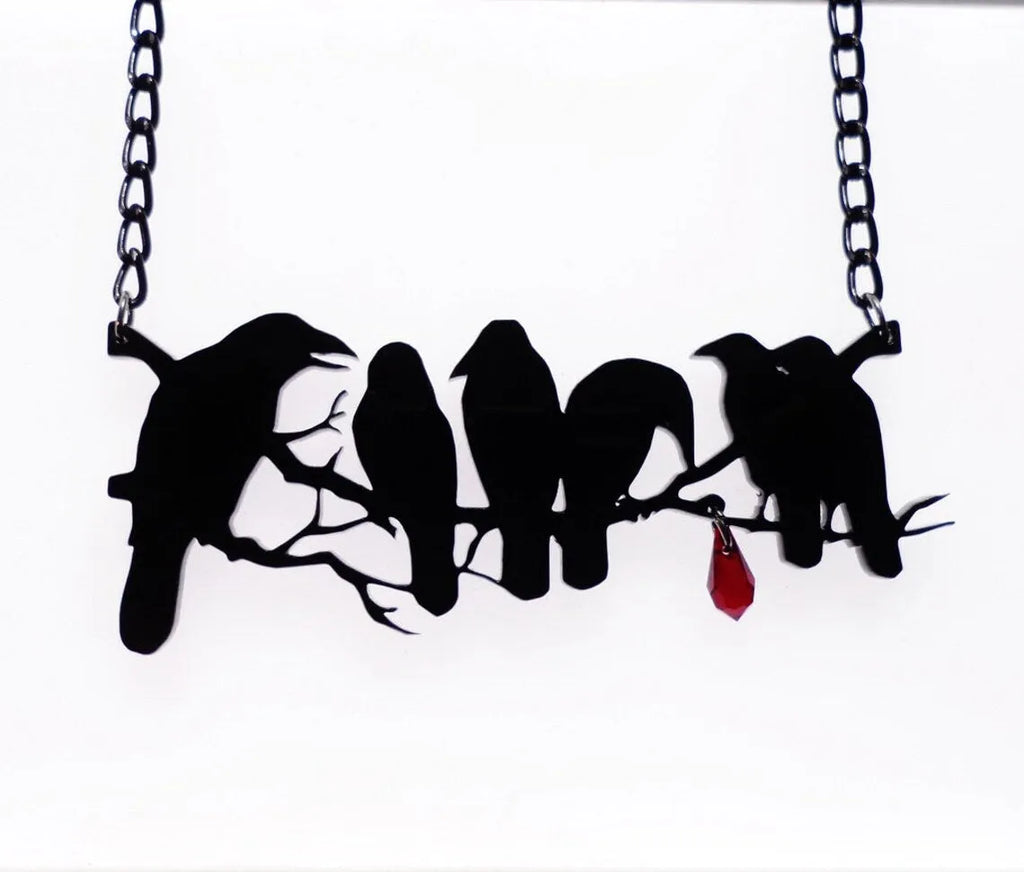 Black crow necklace with bird zodiac pendant on cross chain for women's alternative fashion jewellery