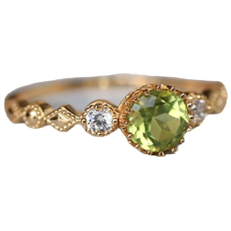 Japanese style women's copper ring with imitation peridot and quadrilateral geometric design