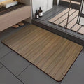 Square diatomite bathroom floor mat with wood grain pattern and non-slip base.
