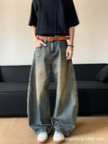 Men's distressed retro blue denim trousers with wide-leg silhouette and micro-elastic cotton-blend fabric