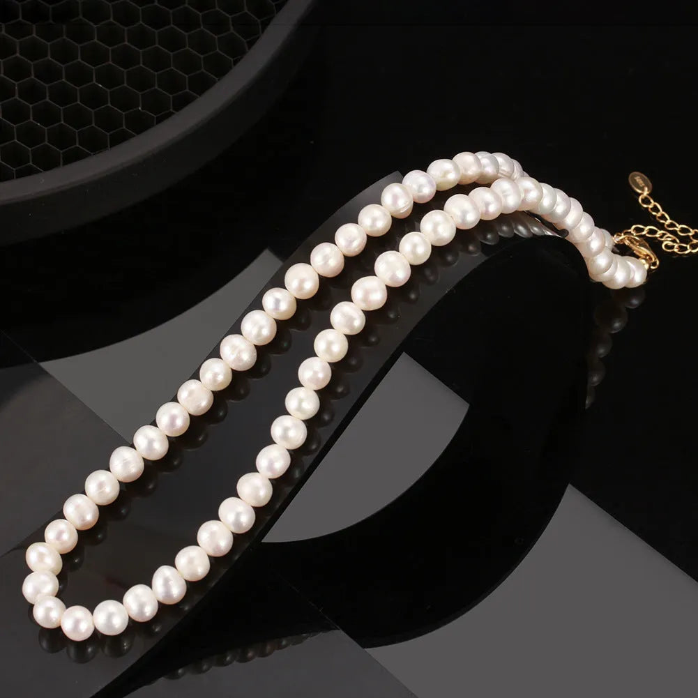 Women's adjustable necklace with freshwater pearls on sterling silver chain