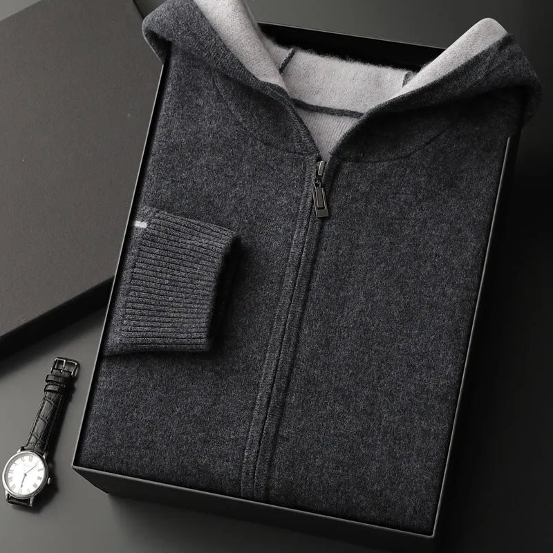A man wearing a dark blue half-high collar zipper cardigan, a loose thickened sweater for winter.