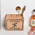 Open-top wooden kitchen storage box with internal grid divider for organising utensils.