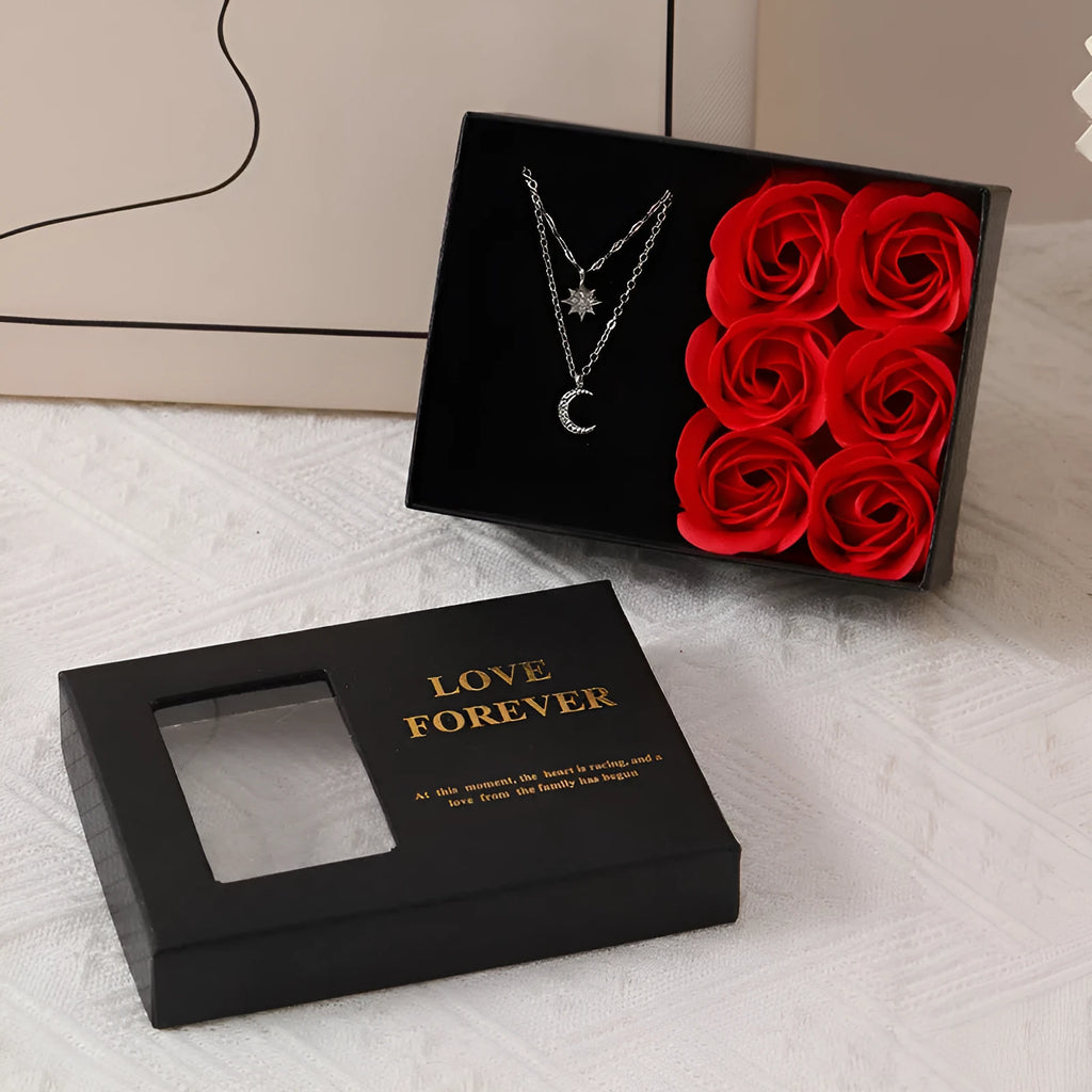 Korean-style gift box open to show six red rose-shaped soap flowers with gift handbag.