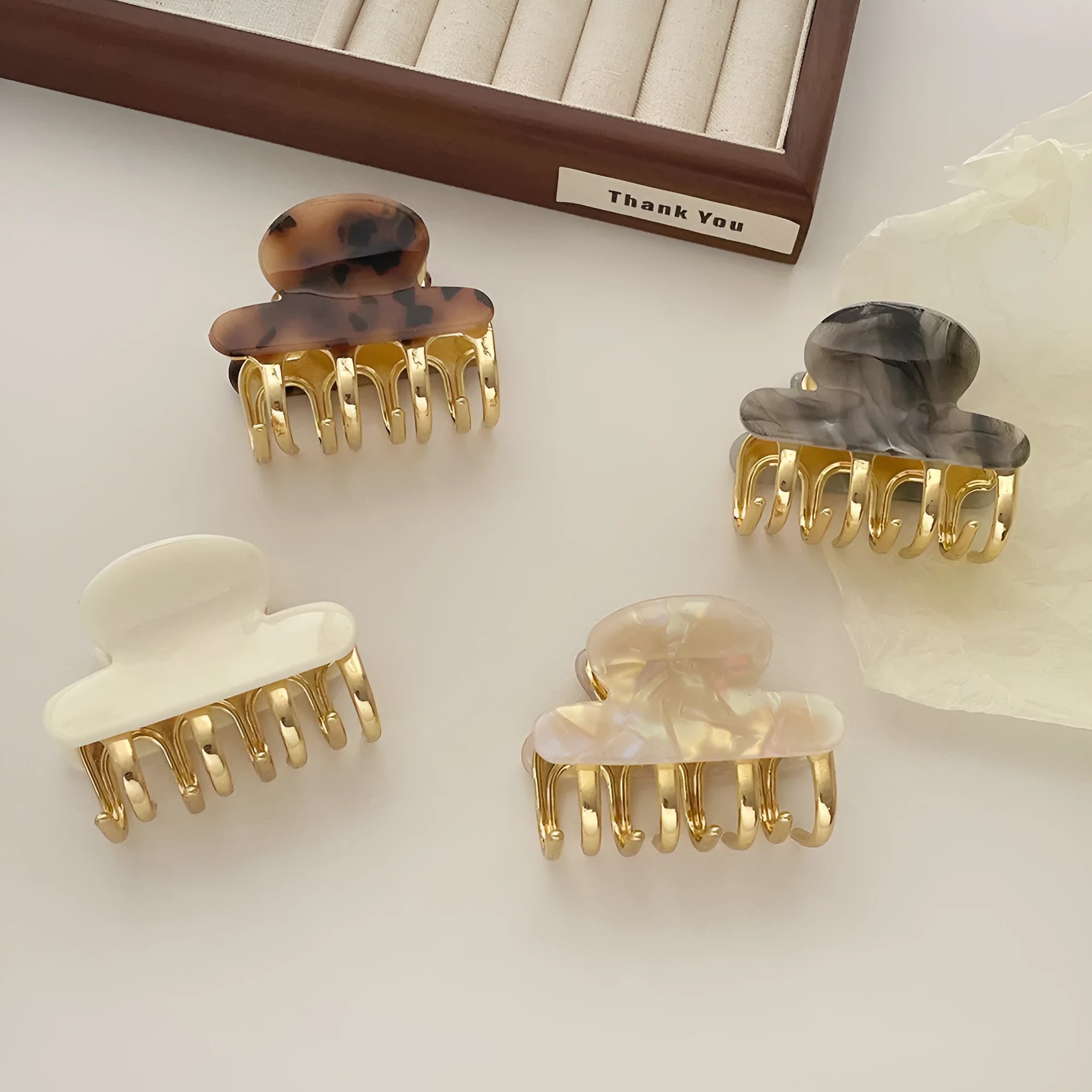 Women's retro acetate barrettes with metal grip in four colour variations including leopard print
